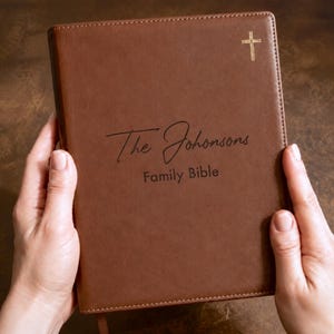 Personalized NIV family Bible with custom name, leatherette cover, and elegant design for a wedding Bible guest book and family keepsake.