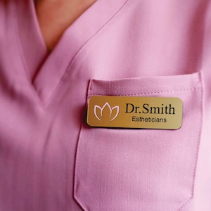 Custom employee name tags with UV-printed company logos in full color. Professional acrylic magnetic badges for staff identification in offices, hospitals, salons, and trade shows. Durable, waterproof, and scratch-resistant name plates.