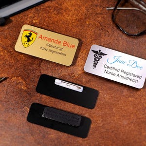 Custom color-printed magnetic name badges with UV-printed logo and employee details. Personalized acrylic office name tags for staff uniforms and professional branding. Durable, long-lasting full-color company badges.