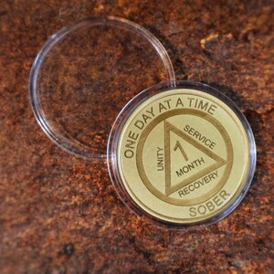 Personalized AA chip sobriety coin with custom year engraving recovery milestone token meaningful alcohol recovery gift idea.