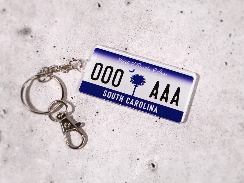 Personalized license plate keychain for new drivers — customizable with your text, initials, or numbers. Acrylic tag replicates real U.S. license plates for a fun, authentic look. Ideal car accessory and thoughtful gift for teens, graduates, or first-time car owners. A small but memorable keepsake for anyone celebrating a new car or license milestone.