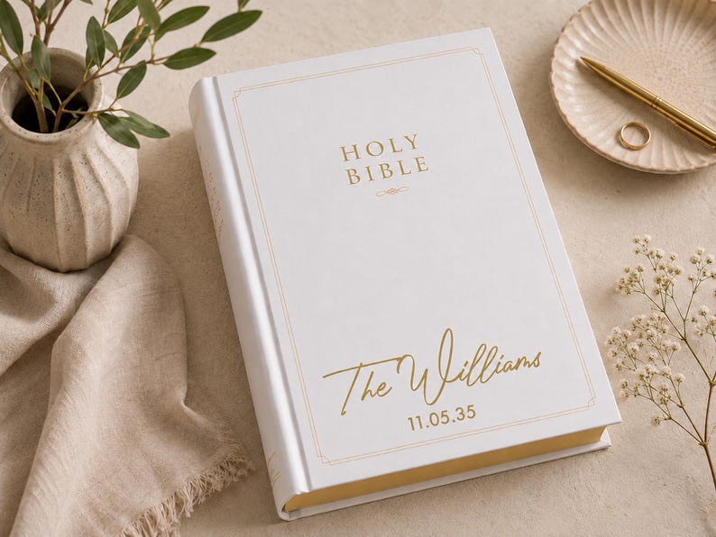 Wedding Bible personalized with your family surname and wedding date on a beautiful white hardcover NIV Family Bible. This custom family Bible creates a lasting family keepsake and heirloom Bible, making a thoughtful Christian wedding gift, anniversary Bible, religious keepsake, personalized Bible, and scripture gift.