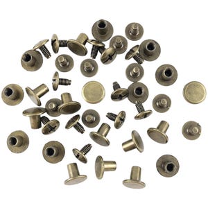 May include: A collection of 30 antique brass-colored metal screw-on studs. The studs have a round head and a short, cylindrical post with a screw thread. The studs are scattered on a white background.