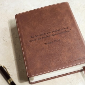Religious wedding Bible guest book alternative made from genuine leather NIV Bible with custom family name engraving. Christian wedding shower gift, personalized anniversary gift, heirloom family Bible.