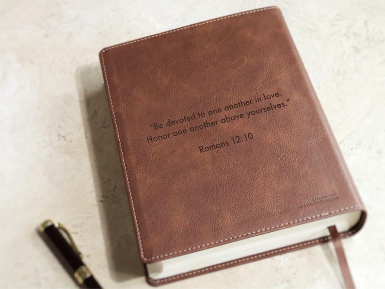 Religious wedding Bible guest book alternative made from genuine leather NIV Bible with custom family name engraving. Christian wedding shower gift, personalized anniversary gift, heirloom family Bible.