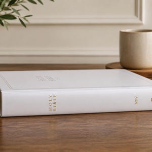 NIV Family Bible customized with your family name for weddings, anniversaries, housewarmings, and Christian celebrations. This personalized Bible features a durable UV printed cover, making it a beautiful custom family Bible, heirloom Bible, wedding Bible, baptism gift, religious keepsake, and meaningful family treasure.