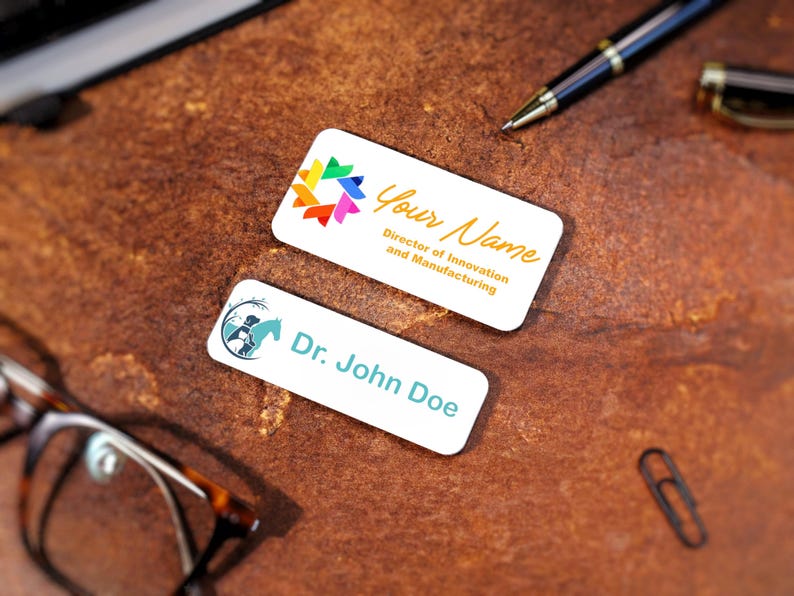 Custom logo magnetic name badge printed in full color with company emblem and employee title. Professional office name tags for businesses, real estate agents, and healthcare staff. High-quality UV-printed acrylic badge with metallic finish.