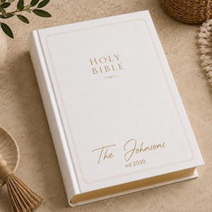 Anniversary Bible personalized with your family name and special date on a premium white family Bible. Beautiful UV printed Bible cover makes an unforgettable Christian wedding gift, family keepsake, heirloom Bible, personalized Bible, custom family Bible, religious keepsake, scripture gift, and home décor.