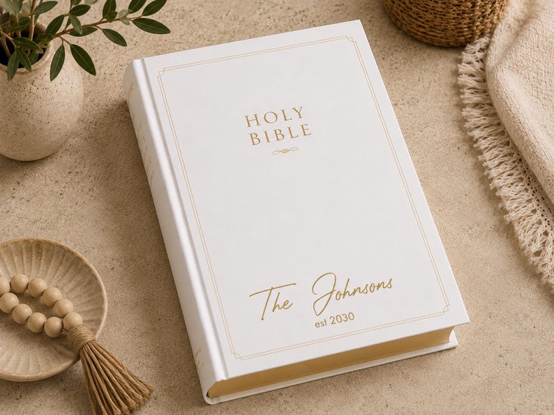 Anniversary Bible personalized with your family name and special date on a premium white family Bible. Beautiful UV printed Bible cover makes an unforgettable Christian wedding gift, family keepsake, heirloom Bible, personalized Bible, custom family Bible, religious keepsake, scripture gift, and home décor.