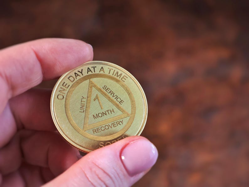 Custom AA sobriety chip laser engraved recovery coin with personalized anniversary year thoughtful sobriety gift for men in recovery.