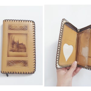 Cartera vintage de cuero con cremallera y relieve, hecha a mano, estilo western.