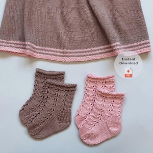 May include: A knitted baby dress and two pairs of baby socks. The dress is brown with pink trim. One pair of socks is brown, and the other is pink. The socks have a decorative openwork pattern. The image includes a "Instant Download" graphic.