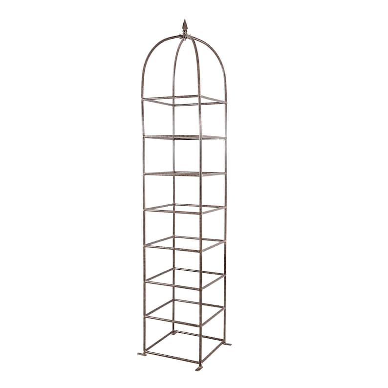 May include: A tall, vertical garden obelisk trellis constructed from dark brown metal. The structure features a square base, multiple horizontal square tiers, and a rounded arched top finished with a pointed finial at the very peak.
