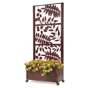 May include: A brown metal planter with wheels and a decorative metal trellis with a leaf design. The planter is filled with green plants and pink flowers.