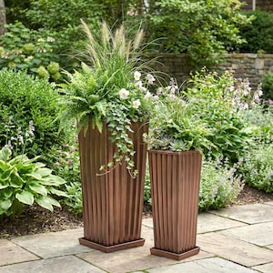 May include: A set of three ceramic mugs with a speckled, matte finish. The mugs are in shades of cream, light gray, and dark gray. Each mug has a simple, minimalist design, perfect for coffee or tea.