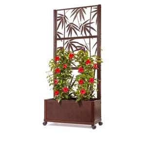May include: A brown metal planter with wheels and a matching metal trellis featuring a bamboo leaf design. The planter is filled with green plants with red flowers.