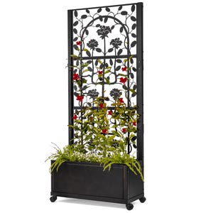 May include: Black metal garden trellis with a planter box at the bottom. The trellis features a decorative floral design and is adorned with green vines and red flowers.