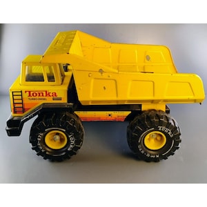 Camión volquete metálico turbodiésel amarillo Tonka XMB-975 vintage de los años 80