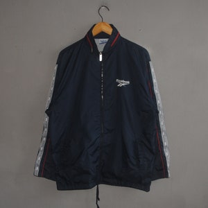 Adidas side tape on sale hoodie
