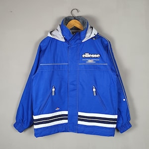 Vintage ELLESSE 1990s Ski windbreaker jacket size Small / 90s outdoor skiwear jacket / Blue Snowboard Winter Pullover