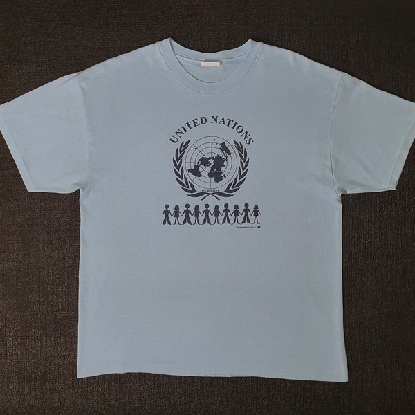Vintage 1990s UNITED NATION UN Women Guild World Peace T shirt size Large / 90s Pbb Peace Organization Logo Distressed tee