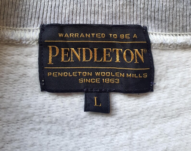 May include: A set of three ceramic mugs with a speckled, matte finish. The mugs are in shades of cream, light gray, and dark gray. Each mug has a simple, minimalist design, perfect for coffee or tea.