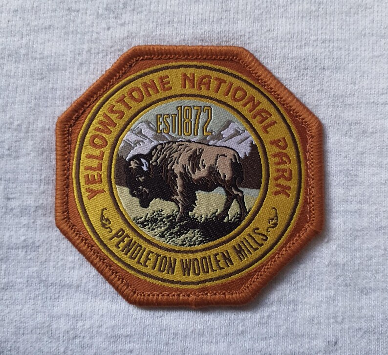 May include: A set of three ceramic mugs with a speckled, matte finish. The mugs are in shades of cream, light gray, and dark gray. Each mug has a simple, minimalist design, perfect for coffee or tea.