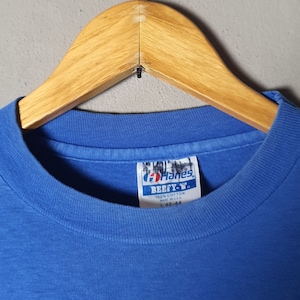 Vintage 1980'S Hanes BEEFY-T T-shirt with blue tag and message print, made in the USA, size L. cotton white type Vintage Second Hand main image 0