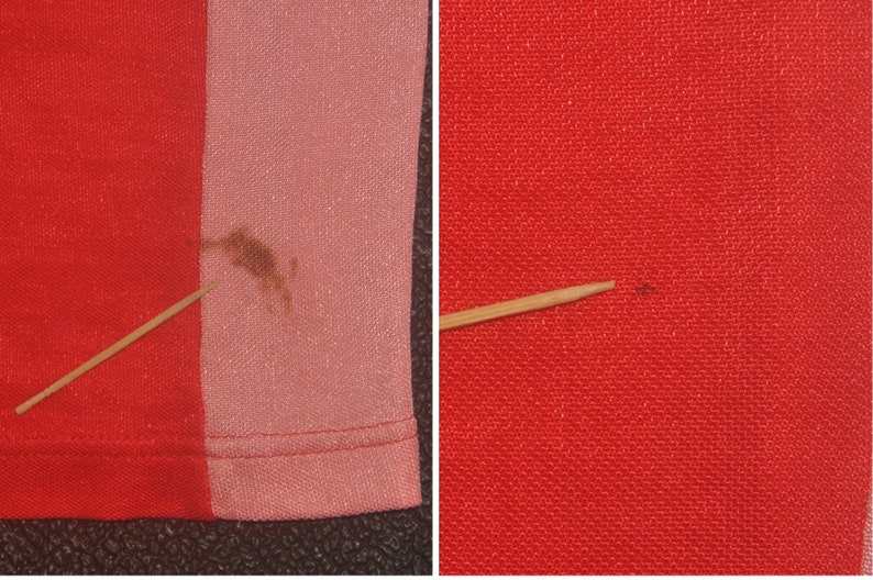 Op de afbeelding: Close-up van een rood en roze gestreepte stof met een bruine vlek op de roze kant. Een tandenstoker is op de stof geplaatst om de textuur te laten zien. De andere kant van de afbeelding toont een close-up van een rode stof met een kleine bruine vlek.