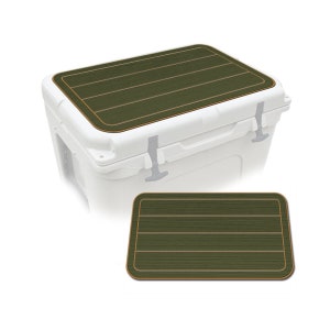 May include: A white cooler with a green and tan lid pad. The pad has a textured surface with horizontal lines and a tan border. A separate pad is shown below the cooler.