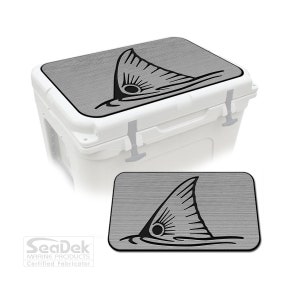 May include: Gray cooler lid with a black redfish tail graphic. The lid is made of a textured material. SeaDek Marine Products Certified Fabricator.