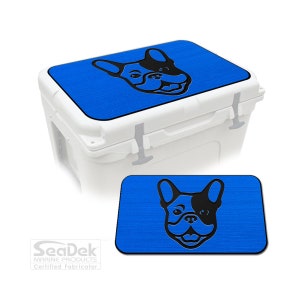 May include: A white cooler with a blue lid and a separate blue pad, both displaying a black French Bulldog graphic. The blue surfaces have a textured finish. The logo "SeaDek Marine Products Certified Fabricator" is shown.