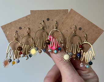 Mini Cosmic puppeteer chandelier earrings in brass , solar system hand earrings