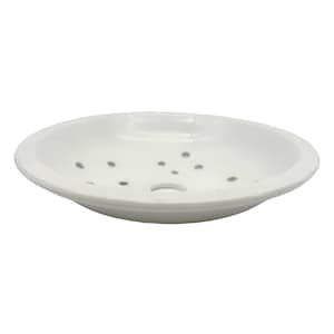 Può includere: Piatto in ceramica bianca con un piccolo foro al centro e più fori piccoli intorno al bordo. Il piatto è progettato per il drenaggio.