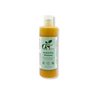 May include: A yellow bottle of ReNewedPet Herbal Flea Shampoo. The bottle is labeled with a green leaf design and the text "Safely & Effectively Kills Fleas & Flea Eggs". The bottle is 8 fl oz (237 ml).