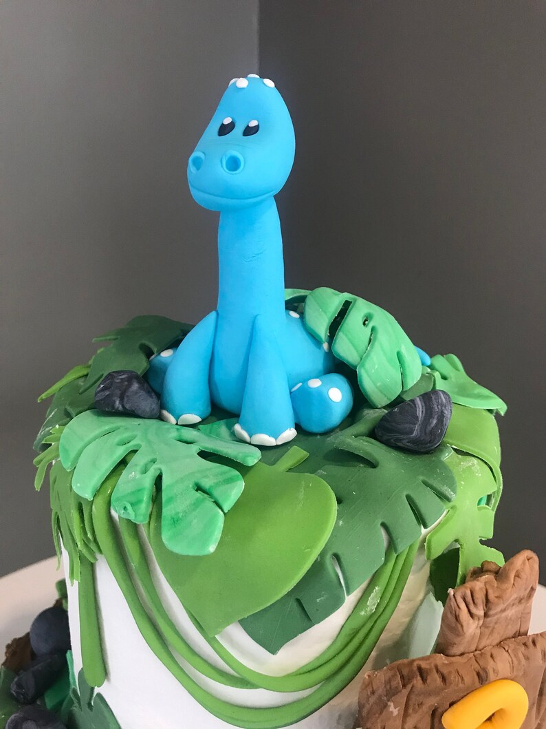 blue dinosaur cake topper