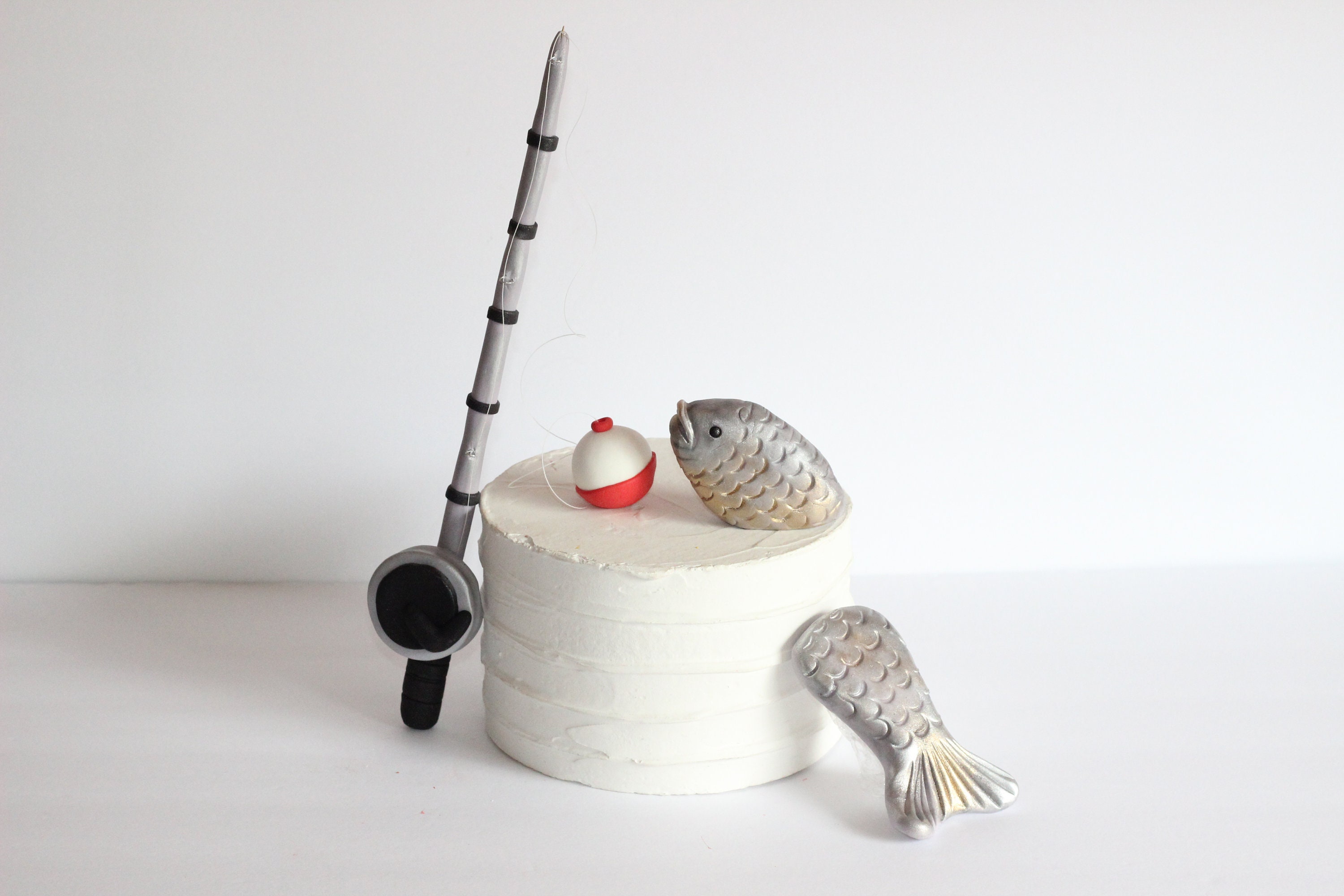 edible fishing pole decorations Ice Hobby Fish Frozen Lake Fishing Rod Cake Topper Image ABPID55983 After 15 to 25 minutes the edible icing art will blend with the frosting to give your cake a professional look Edible fishing pole | Fishing