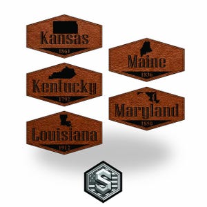 May include: A set of three ceramic mugs with a speckled, matte finish. The mugs are in shades of cream, light gray, and dark gray. Each mug has a simple, modern design and a rounded handle. Perfect for coffee or tea.