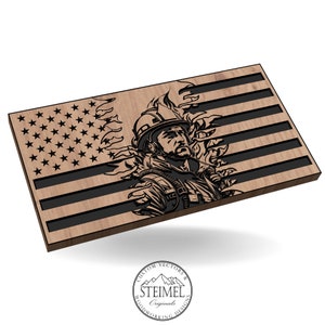 May include: A wooden American flag with a firefighter's helmet and face in the center, surrounded by flames. The flag is cut out to show the firefighter's face and the flames. The text "CUSTOM VECTORS & STEIMEL Originals WOODWORKING DESIGNS" is on a circle below the flag.