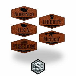 May include: A collection of brown leather patches with patriotic themes. The patches feature the words "America," "U.S.A.," "Freedom," "Liberty," and "Merica," along with the year "1776." A silver and white logo is at the bottom.