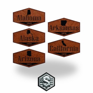 Może przedstawiać: Zestaw trzech ceramicznych kubków z nakrapianym, matowym wykończeniem. Kubki są w odcieniach kremu, jasnoszarym i ciemnoszarym. Każdy kubek ma prosty, minimalistyczny design i zaokrąglony uchwyt. Kubki są ułożone jeden na drugim.