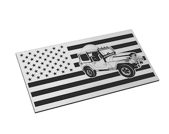 May include: A rectangular metal sign featuring the American flag with a black and white striped design. A detailed illustration of a Jeep is superimposed on the flag. The stars and stripes are clearly visible.