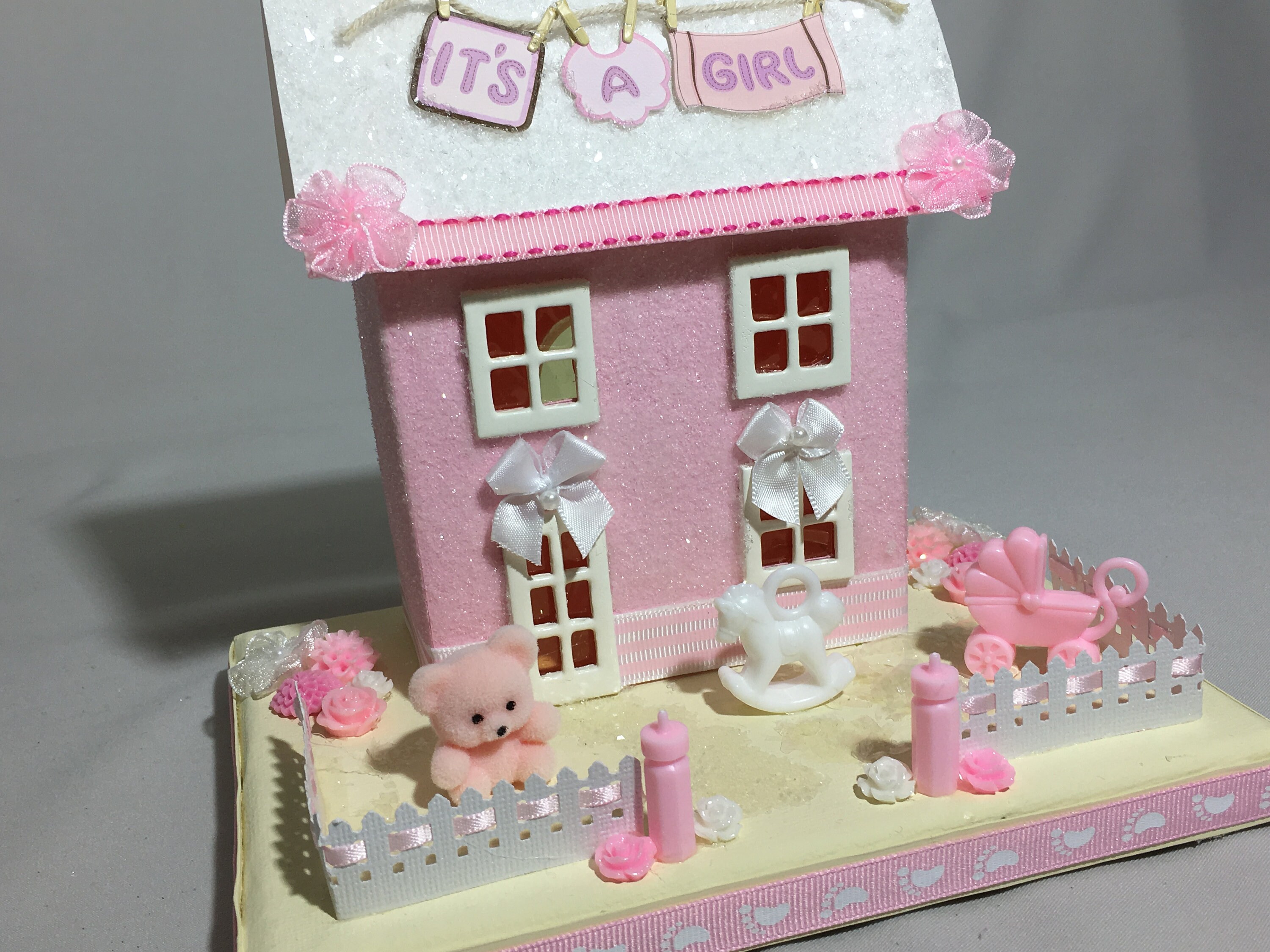 pink and white rocking horse