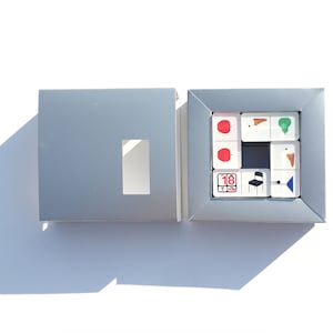 cartèa - Domino in plexiglas dedicato al designer Enzo Mari