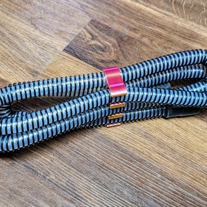 CPAP Travel Hose Keeper Organizer Compact Version, works with 19mm OD tubing. Not for Climateline Air Oxy or other 22mm OD tubing.