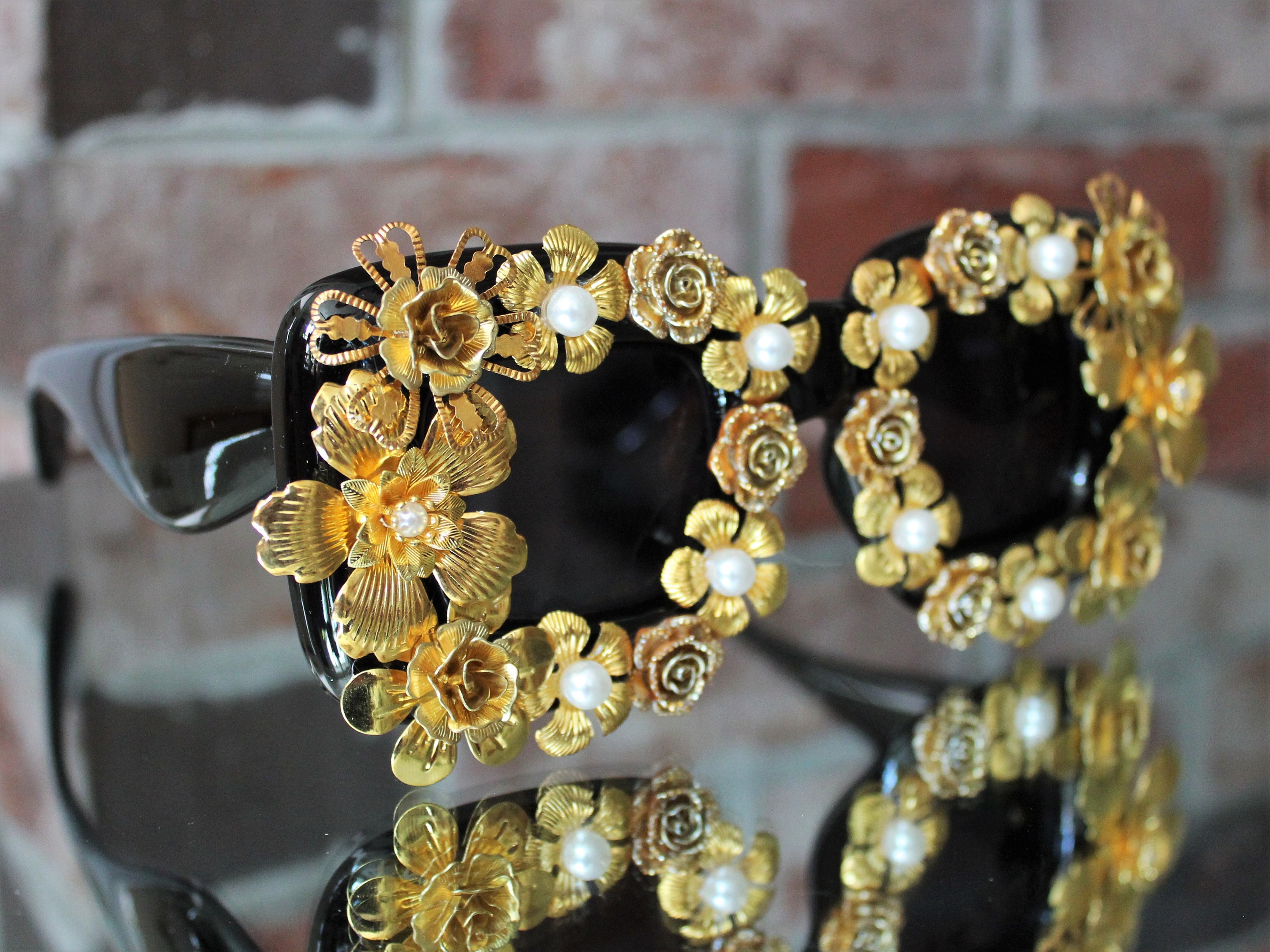 Sunglasses with gold flowers on sale