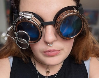 Copper Colored Steampunk Goggles with Blue Lenses, Metal Clock Gears, & Removable Magnifying Glass Attachment - Steam Punk Cosplay Accessory