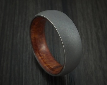 Titanium ring with desert ironwood burl hardwood sleeve custom made band