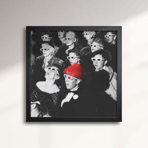 May include: A black and white photo of a group of people wearing 3D glasses, watching a movie. One person is wearing a red hat with blue and red 3D glasses.