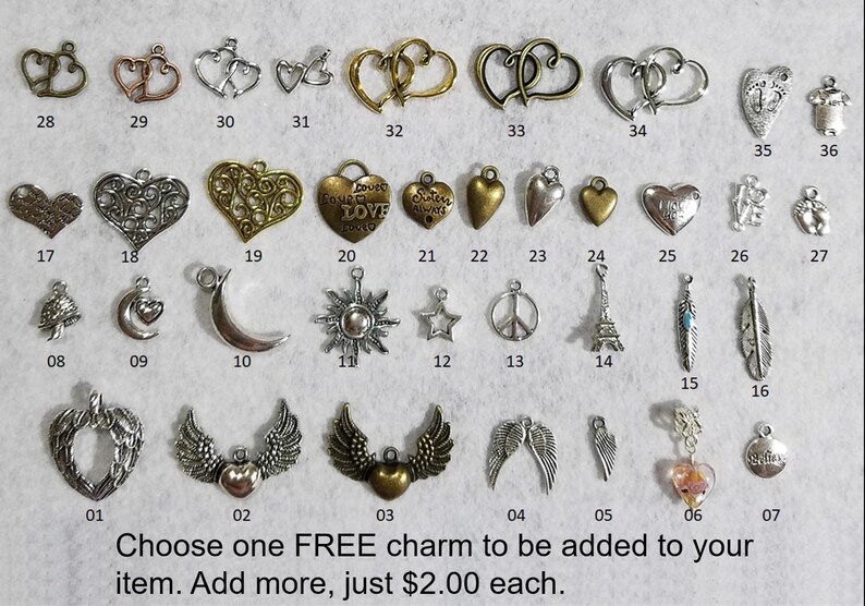 May include: A selection of 36 silver and gold charm pendants, including hearts, moons, stars, feathers, and more. Choose one free charm to be added to your item. Add more for $2.00 each.